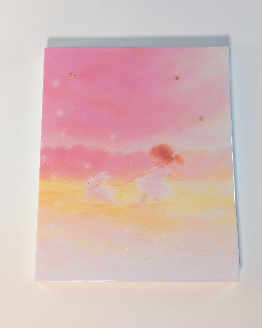 仕上がった作品:ピンクの空の下、うさぎと駆ける女の子の絵